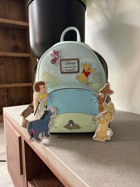 Loungefly Pastel Blue Winnie the Pooh Character Mini Backpack